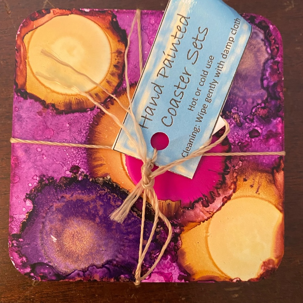Hand painted coaster set of 4 with rubber bumpers on back.